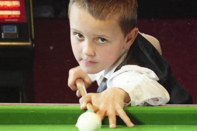 Marc Smith was doing wonders on the snooker table, even though he was only 8 at the time.