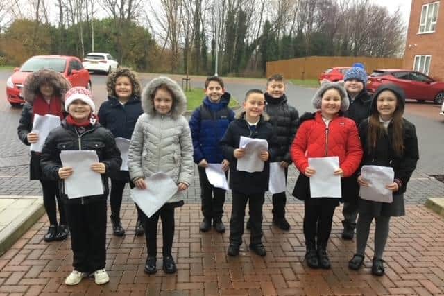 Pupils at New Silksworth Academy have been bringing festive cheer to their local community.