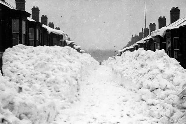 Snow drifts which were almost as tall as the houses in Guisborough Street in 1947. Photo: Bill Hawkins.