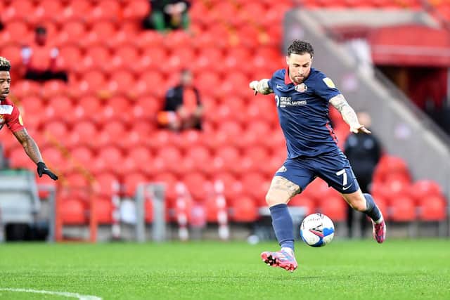 Chris Maguire lines up a shot at the Keepmoat Stadium