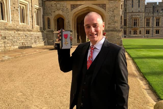 Rob Lawson received his OBE in a presentation at Windsor Castle