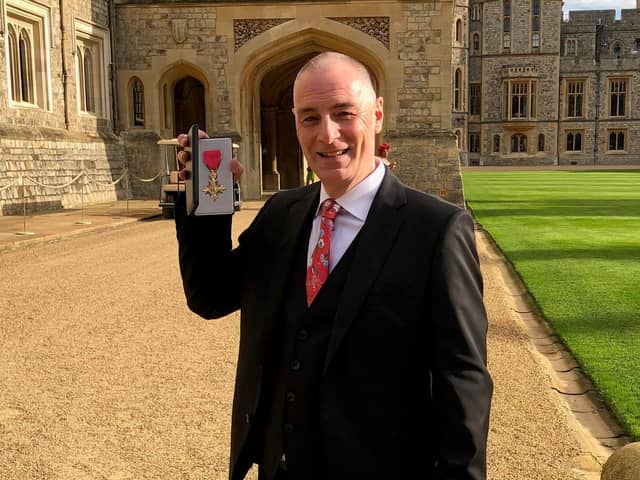Rob Lawson received his OBE in a presentation at Windsor Castle