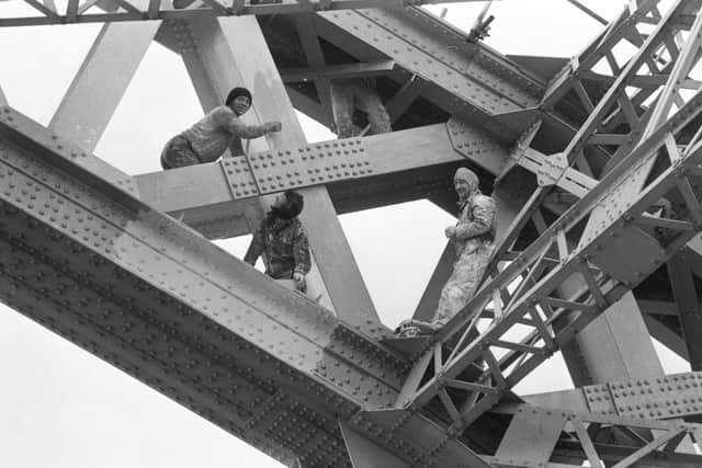 Workers were pictured painting Wearmouth Bridge 45 years ago.