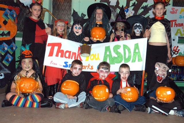 Children enjoying the Halloween party at St Mark's Community Centre with the help of donations from Asda in 2004.