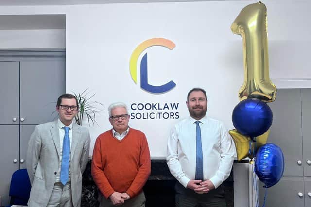 Cooklaw Solicitors team celebrating their first birthday. 