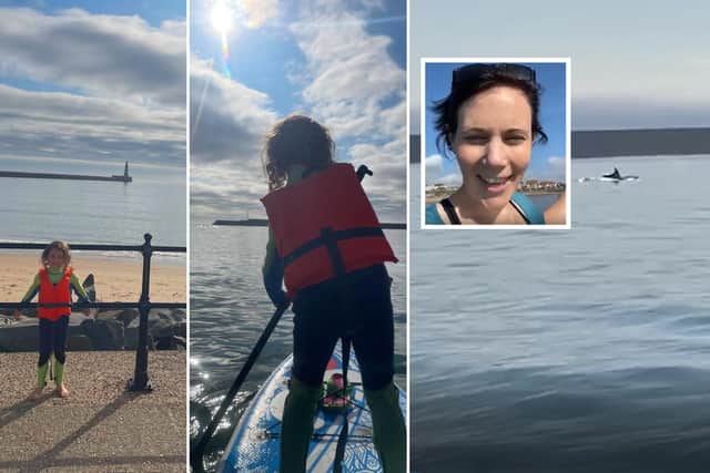 Mum Amy Martin, 39, and her daughter Cora, six, took to their paddle board to film the dolphins between the piers at Roker on the morning of August 24, 2021.