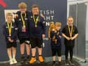 From left: weight lifters Matthew Lawrance, Jacob McDonald, James Newton, Carter Mason (and friend) and Archie Fowler of Weights & Cakes after their recent success at the British Age Group Championships in Leeds.