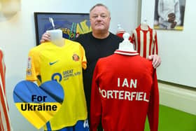 Fans' Museum founder Michael Ganley with one of the yellow and blue SAFC away strips and Ian Porterfield's 1973 FA Cup tracksuit top