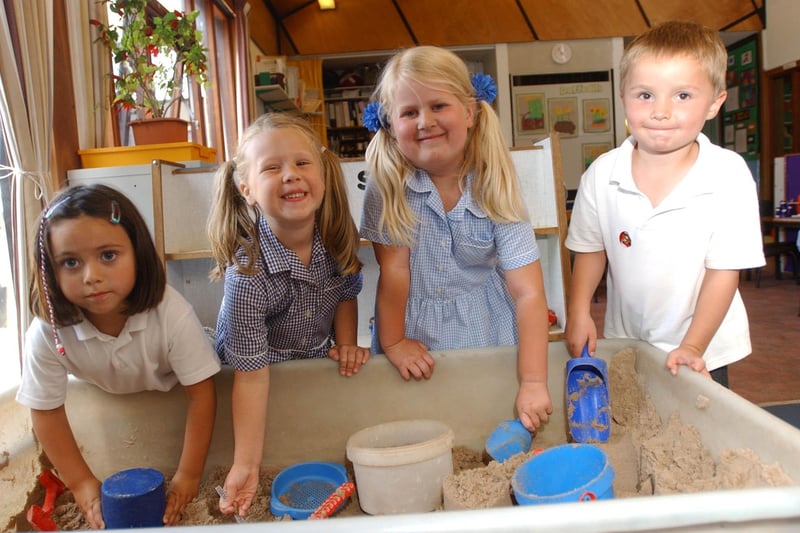 Having fun at the Eldon Grove Primary School sandpit in 2003. Is there a familiar face in this photo?