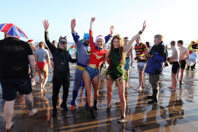 Catwoman, Batman, Wonder Woman and Poison Ivy brave the waters