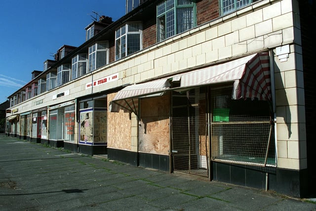 The derelict row of shops on Poulton Road in Fleetwood, opposite St. Wulstan's Church. They were once the heart and soul of community shopping but by 1999 they were closed and ready for redevelopment as flats