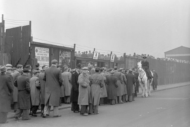 Fans queued up at the Victoria Ground before an FA Cup match against Darlington in 1955. The crowd of 12,450 saw a 1-1 draw. It was only after two more matches that Pools got through to the next round.