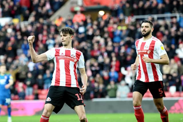 Tom Flanagan is targeting back-to-back promotions after signing a new contract at Sunderland