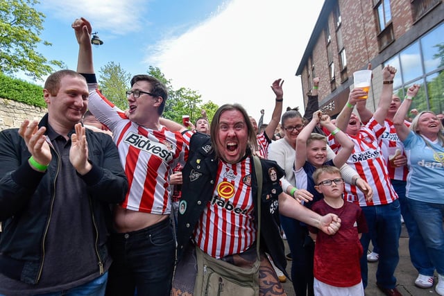 Pint glasses are raised after the first Sunderland goal.
