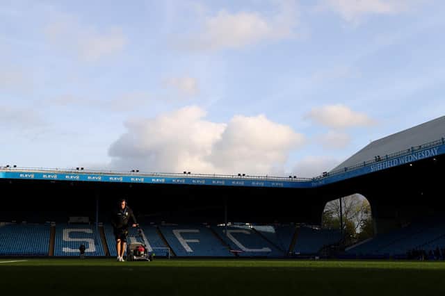SHEFFIELD, ENGLAND - NOVEMBER 07: A member of ground staff on the pitch following the Emirates FA Cup First Round match between Sheffield Wednesday and Plymouth Argyle at Hillsborough on November 07, 2021 in Sheffield, England. (Photo by George Wood/Getty Images)