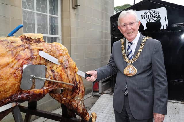 Mayor of Sunderland Coun Harry Trueman cuts the first slice