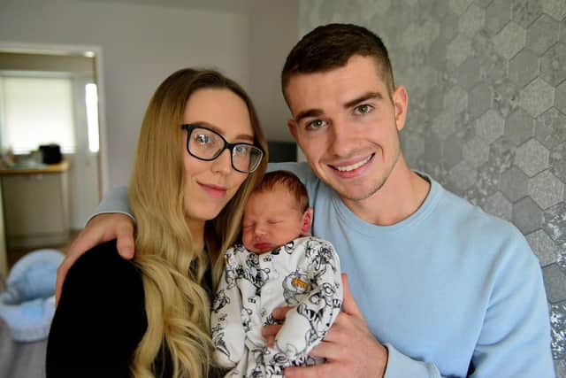 Sean Collard (26) and Sophie Campbell with their 9 day old son Lucas. Picture by FRANK REID