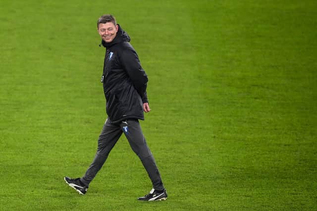 Malmo's Danish coach Jon Dahl Tomasson smiles during a training session on December 7, 2021 at the Juventus stadium in Turin, on the eve of their UEFA Champions League Group H football match against Juventus. (Photo by Marco BERTORELLO / AFP) (Photo by MARCO BERTORELLO/AFP via Getty Images)