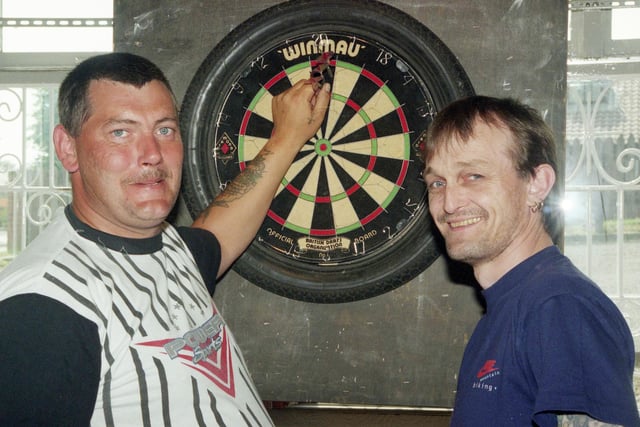 Darts players raised cash at New Hesledon Club to keep Murton Colliery Band going by having a 12 hour throwing marathon.  Here are Tony Wilson, left and Tom Hudson starting the game.