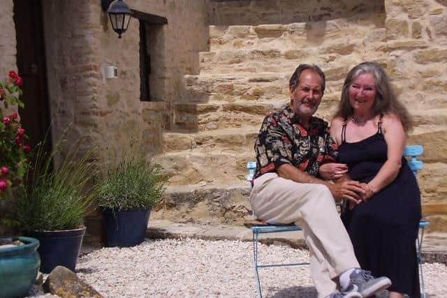 The couple outside their Italian home.