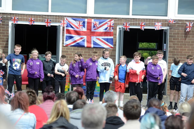 Children from Town End Academy performed songs from some of the Queen's known favourite artists.