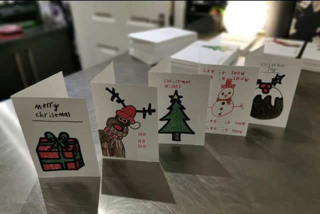 Jessica designed Christmas cards which have been professionally printed to sell and raise money.