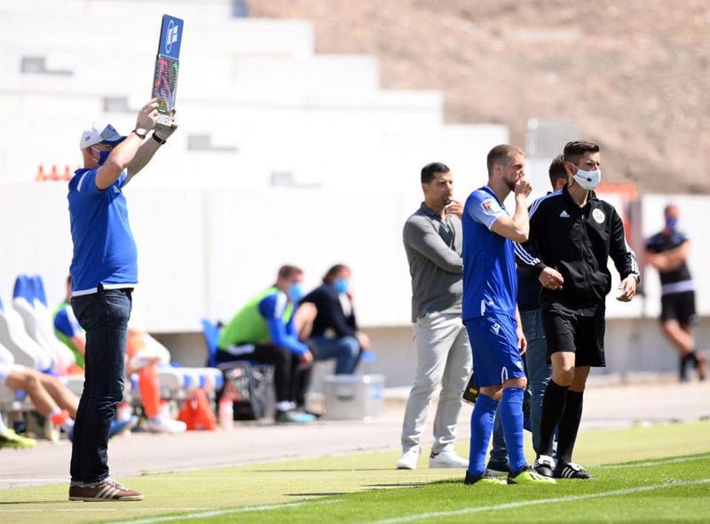 The fourth official and other members of staff on the touchline wore masks throughout the game.