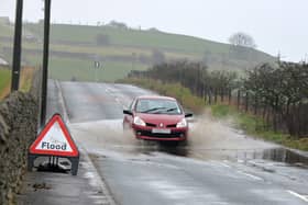 Flooding on Lizard Lane, Whitburn, in recent years. There are now plans to tackle the problem.