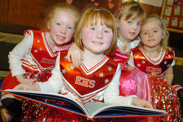 Charlotte Woods, Laura May Watt, Holly Robson and Millie Beston enjoying World Book Day at Hill View Infants School in 2009.