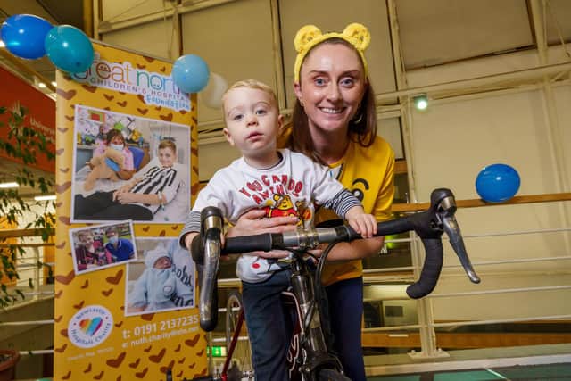 Sarah Ford with son Freddie on her cycling challenge.

Picture: DAVID WOOD