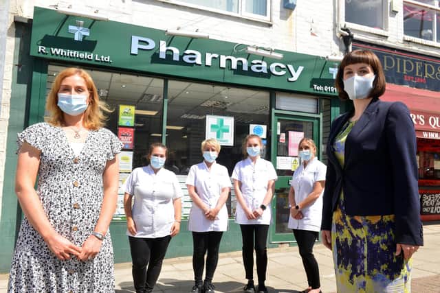 Bridget Phillipson MP, right, visited the Easington Lane pharmacy where she met pharmacist Siobhan Todd, left and staff. Picture by Stu Norton.