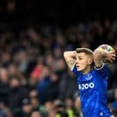 Everton's French defender Lucas Digne takes a throw in during the English Premier League football match between Everton and Liverpool at Goodison Park in Liverpool, north west England on December 1, 2021. (Photo by PAUL ELLIS/AFP via Getty Images)