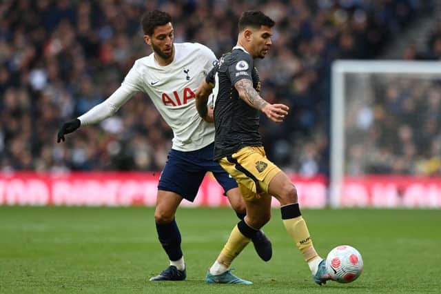 Newcastle United's Bruno Guimaraes vies with Tottenham Hotspur's Rodrigo Bentancur (Photo by GLYN KIRK/AFP via Getty Images)