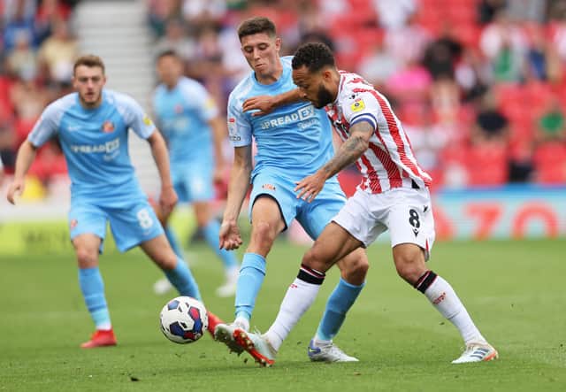 Lewis Baker of Stoke City under pressure from Ross Stewart of Sunderland during the Sky Bet Championship match.
