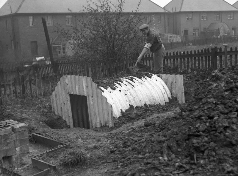 Building an air raid shelter on Ford Estate in March 1939.