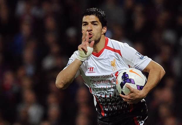 Luis Suarez celebrates after scoring for Liverpool. (Photo by John Powell/Liverpool FC via Getty Images)