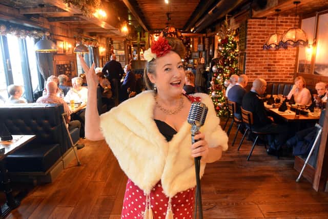Local housing residents Christmas free lunch party at the Seaburn Inn with entertainer Vicky Sandison.