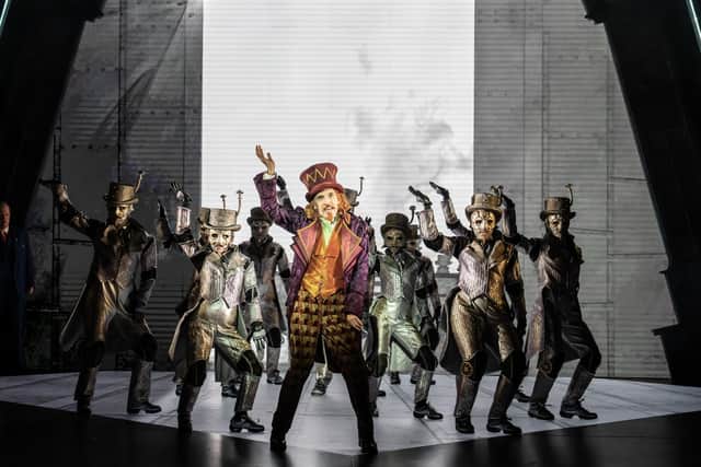 Oompa Loompas with Gareth Snook (Willy Wonka) in Charlie and the Chocolate Factory - The Musical. Photo Johan Persson.