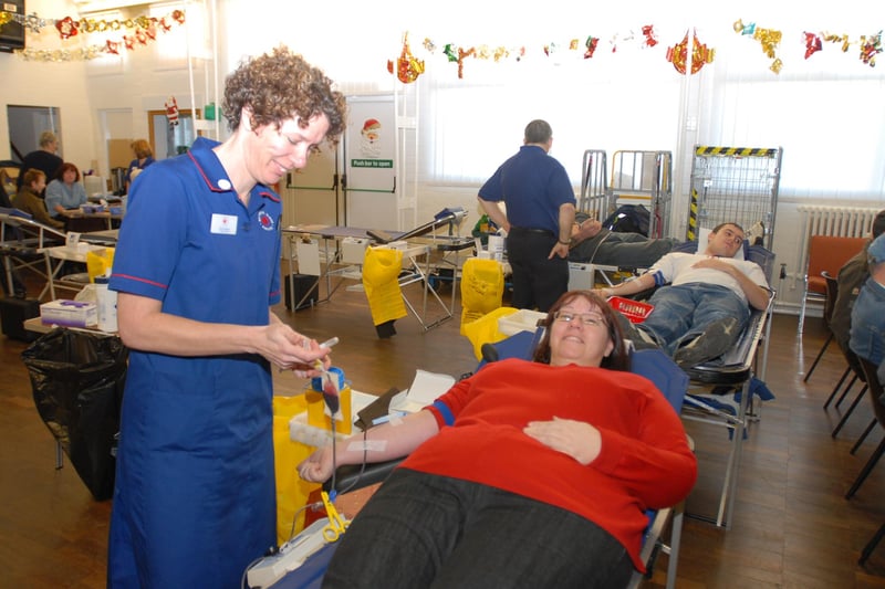 Mother and son Lynn and Mark Hodson were pictured giving blood at St John the Baptist church in 2006.