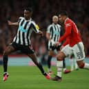 Alexander Isak of Newcastle United is challenged by Casemiro of Manchester United during the Carabao Cup Final match between Manchester United and Newcastle United at Wembley Stadium on February 26, 2023 in London, England. (Photo by Eddie Keogh/Getty Images)