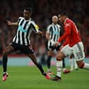 Alexander Isak of Newcastle United is challenged by Casemiro of Manchester United during the Carabao Cup Final match between Manchester United and Newcastle United at Wembley Stadium on February 26, 2023 in London, England. (Photo by Eddie Keogh/Getty Images)
