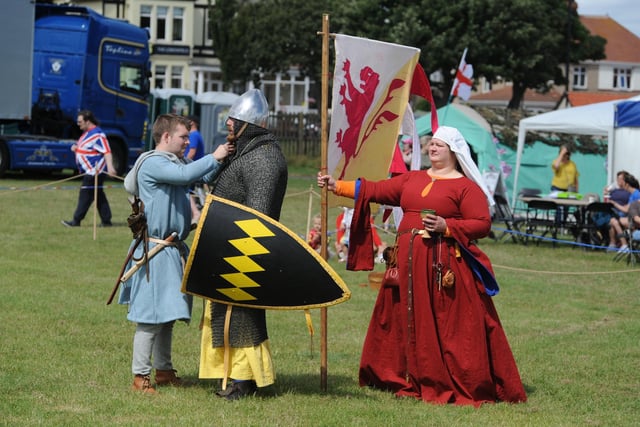 A medieval combat display was entertaining crowds.