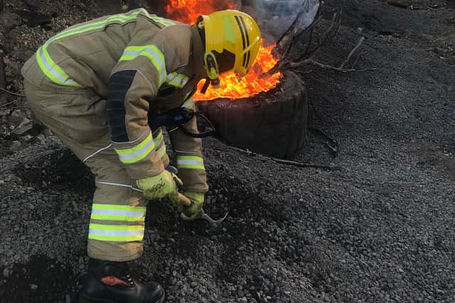 Firefighters tackle a fire at Springwell Quarry
