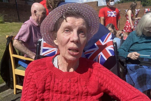 A resident at Bryony Lodge relaxing in the sun during the Jubilee celebrations.