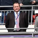 Mike Ashley, Newcastle United owner and Lee Charnley look on prior to the Premier League match between Tottenham Hotspur and Newcastle United at Wembley Stadium on February 2, 2019 in London, United Kingdom.