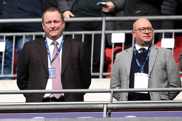 Mike Ashley, Newcastle United owner and Lee Charnley look on prior to the Premier League match between Tottenham Hotspur and Newcastle United at Wembley Stadium on February 2, 2019 in London, United Kingdom.
