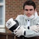 Boxer Tommy Ward when he prepared for a 30-mile charity walk in PPE during 2020.