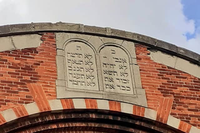The luhot (Ten Commandments) above the synagogue's main entrance. JPI image.