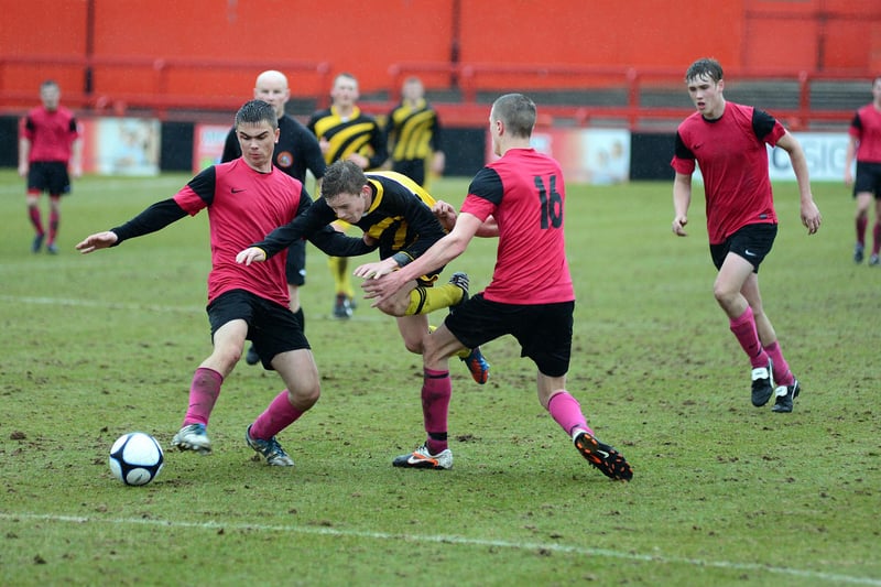 Action from Pride of Shirebrook (pink strip) v Ashfield Scaffolding in the U18's final at Alfreton Town.
