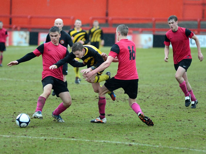 Action from Pride of Shirebrook (pink strip) v Ashfield Scaffolding in the U18's final at Alfreton Town.